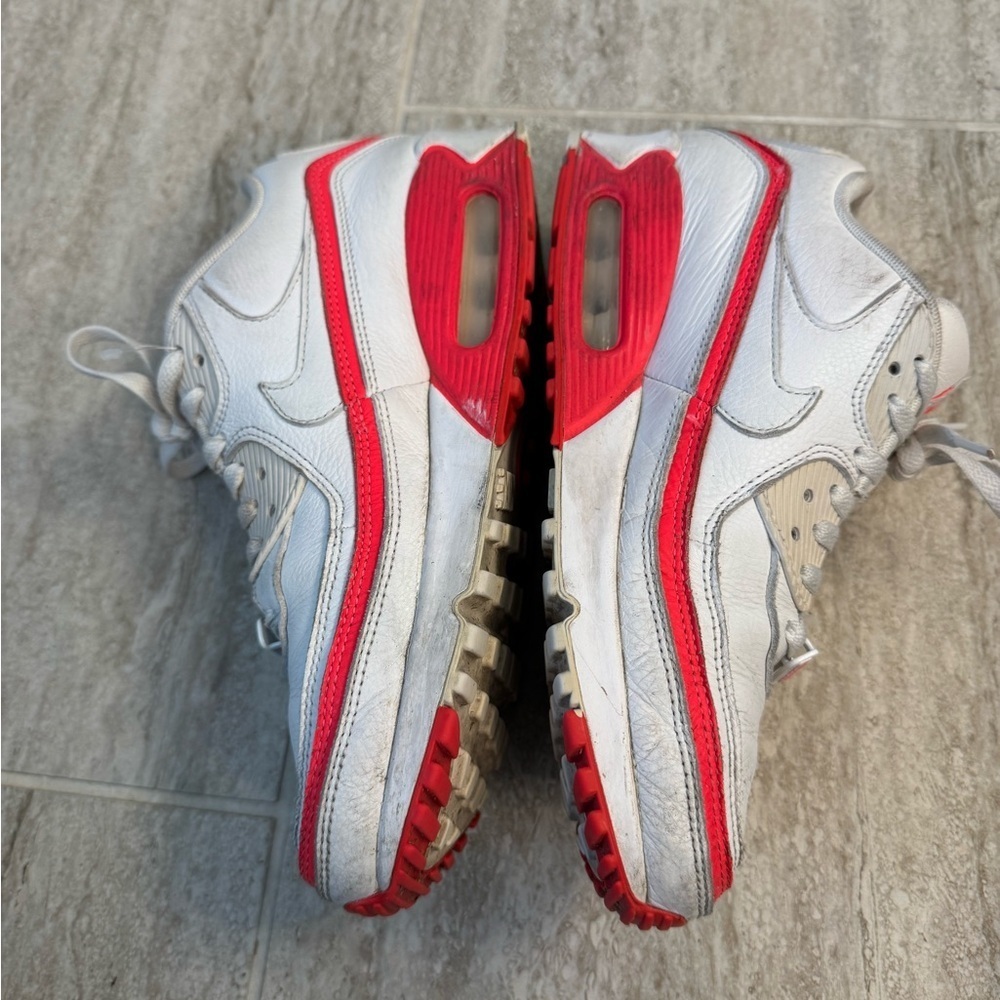 Nike Undefeated x Air Max 90 in a white and solar red colorway